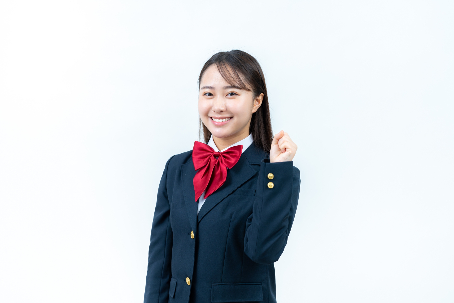 ガッツポーズをする学生