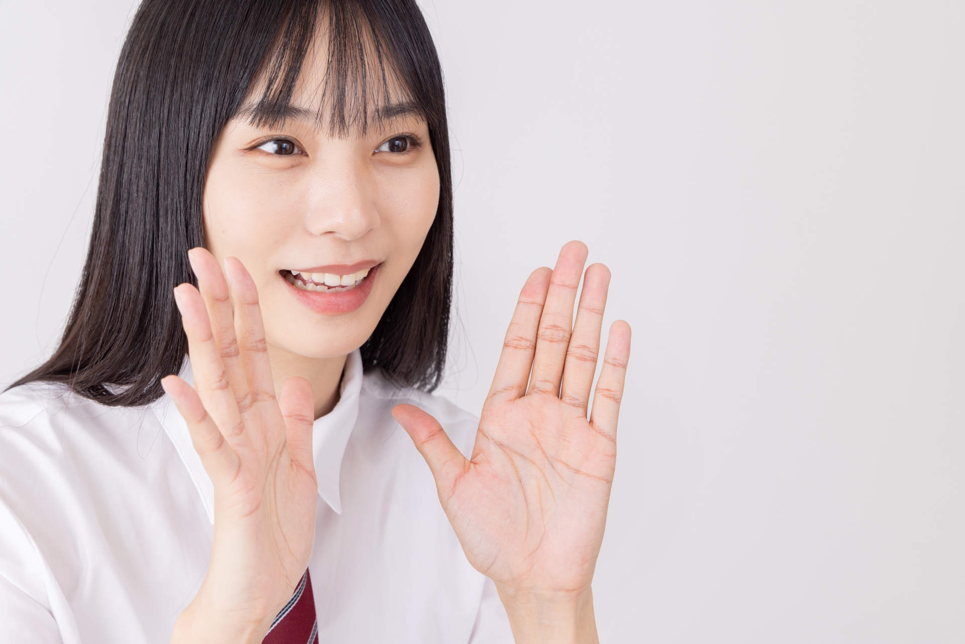 声援・応援する女子高生　内緒話・秘訣