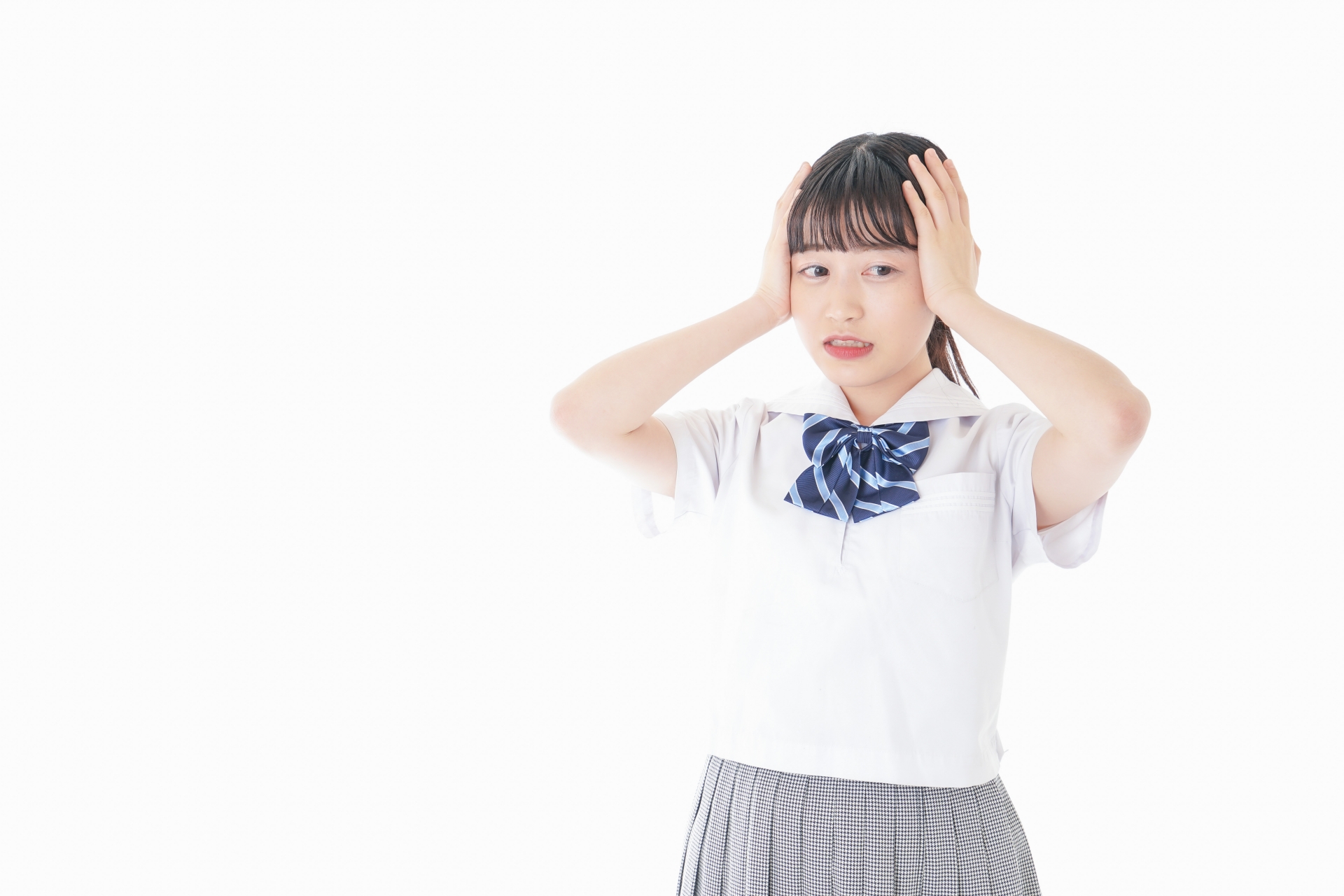 考え事をする学生